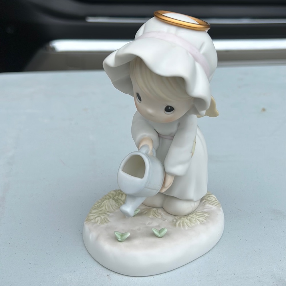 Precious Moments Figurine: “Some Plant, Some Water, But God Giveth The Increase”